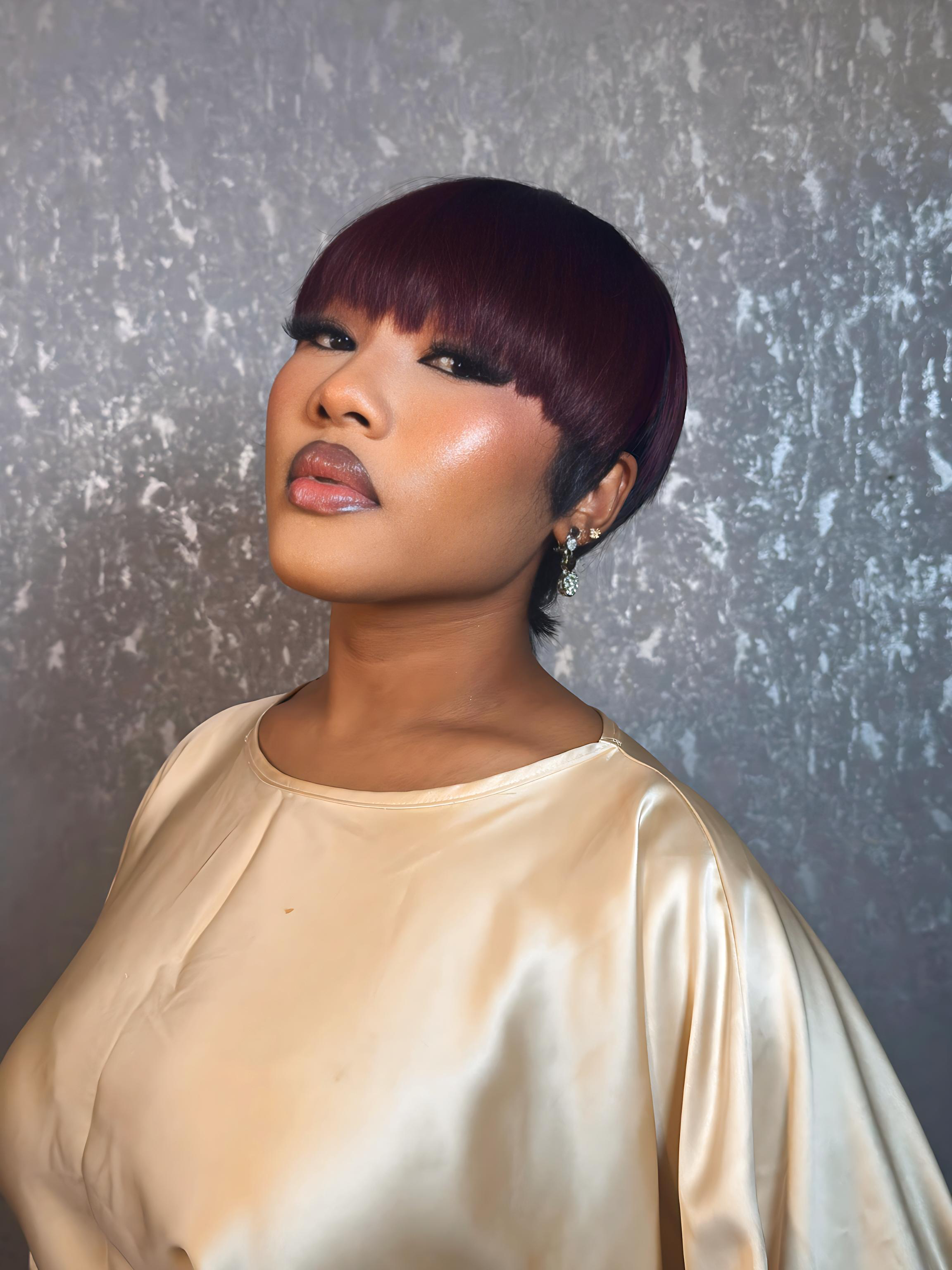 Black pixie fringe with burgundy highlights